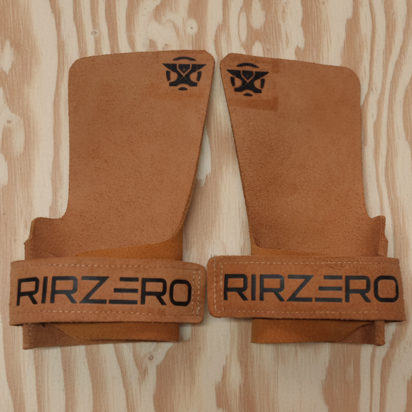 Calleras RIRZERO naranjas con fondo de madera